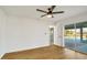 Bedroom with pool view and sliding glass doors at 527 Rotonda Cir, Rotonda West, FL 33947