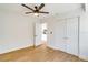 Light and airy bedroom with double door closet and wood flooring at 527 Rotonda Cir, Rotonda West, FL 33947