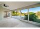 Covered lanai overlooking the pool and backyard at 527 Rotonda Cir, Rotonda West, FL 33947