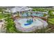 Fun water playground for , featuring slides and sprinklers at 5414 Mystic Water Cv, Bradenton, FL 34211