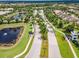 Aerial view of community entrance and landscaping at 5610 Rain Lily Ct, Sarasota, FL 34238