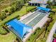 Two bocce ball courts with shade structures at 5610 Rain Lily Ct, Sarasota, FL 34238