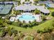 Community pool and clubhouse aerial view at 5610 Rain Lily Ct, Sarasota, FL 34238