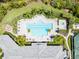 Resort-style pool with plenty of lounge chairs at 5610 Rain Lily Ct, Sarasota, FL 34238