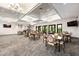 Large community room with ample seating for gatherings at 5610 Rain Lily Ct, Sarasota, FL 34238