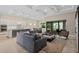 Open concept kitchen with island, stainless steel appliances, and white cabinets at 5610 Rain Lily Ct, Sarasota, FL 34238