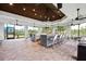 Covered outdoor bar area adjacent to the pool at 5610 Rain Lily Ct, Sarasota, FL 34238