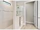 Spacious walk-in shower with glass enclosure and tile surround at 5610 Rain Lily Ct, Sarasota, FL 34238