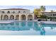 Resort-style pool with surrounding patio furniture at 6101 34Th W St # 11B, Bradenton, FL 34210