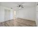 Bright bedroom with wood-look flooring and ceiling fan at 6124 29Th W Ave # 6124, Bradenton, FL 34209