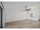 Spacious living room with light walls and vinyl plank flooring at 6124 29Th W Ave # 6124, Bradenton, FL 34209