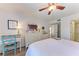 Guest bedroom with comfortable bed and desk area at 635 30Th W Ave # F203, Bradenton, FL 34205