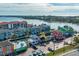 Vibrant waterfront community with colorful buildings, docks, and ample parking at 6536 Sabal Dr, Sarasota, FL 34242