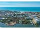 Stunning aerial view showcasing the property's close proximity to the beach and vibrant coastal area at 6536 Sabal Dr, Sarasota, FL 34242