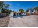 One-story home with a driveway, carport, and some landscaping at 6536 Sabal Dr, Sarasota, FL 34242