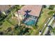 Aerial view of house with pool and fenced backyard at 6670 Horned Owl Pl, Sarasota, FL 34241