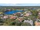 Aerial view of the neighborhood and lake at 8111 Fairhaven Glen, University Park, FL 34201