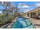 Inviting screened pool and patio; perfect for outdoor relaxation at 8111 Fairhaven Glen, University Park, FL 34201