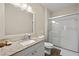 Bathroom boasts granite countertops and a walk-in shower at 2060 Willow Hammock Cir # 304, Punta Gorda, FL 33983
