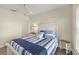 Bedroom with a queen bed and neutral decor at 2060 Willow Hammock Cir # 304, Punta Gorda, FL 33983