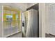 Stainless steel refrigerator in modern kitchen at 2060 Willow Hammock Cir # 304, Punta Gorda, FL 33983