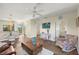 Living room with access to kitchen, dining area, and other rooms at 2060 Willow Hammock Cir # 304, Punta Gorda, FL 33983