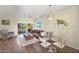 Open living space with dining and kitchen views at 2060 Willow Hammock Cir # 304, Punta Gorda, FL 33983