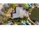 Aerial view of property, showcasing the house and backyard pool at 259 Gladiolus St, Anna Maria, FL 34216