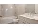 Neat bathroom with shower/tub combo, toilet and vanity at 26903 Pavin Dr, Englewood, FL 34223