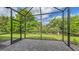 Enjoy the outdoors in this screened patio with a paver brick floor at 26903 Pavin Dr, Englewood, FL 34223