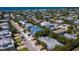 Aerial view of a neighborhood near the beach, showcasing a three-unit building at 303 65Th St # B, Holmes Beach, FL 34217