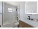 Updated bathroom with a bathtub and modern vanity at 303 65Th St # B, Holmes Beach, FL 34217