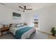 Relaxing bedroom with a comfortable bed and access to a deck at 303 65Th St # B, Holmes Beach, FL 34217
