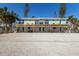 Two-story beach house with private decks and parking at 303 65Th St # B, Holmes Beach, FL 34217