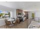 Modern kitchen with stainless steel appliances and light wood cabinets at 303 65Th St # B, Holmes Beach, FL 34217
