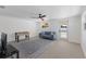Basement recreation area with foosball table, comfortable seating, and access to backyard at 303 65Th St # B, Holmes Beach, FL 34217