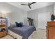 This bedroom offers neutral decor and a ceiling fan for comfortable, relaxing rest at 3115 Trustee Ave, Sarasota, FL 34243