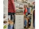 Organized walk-in closet with ample shelving, hanging rods, and storage solutions at 3115 Trustee Ave, Sarasota, FL 34243