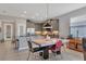 Modern kitchen and eat-in area features stainless steel appliances and opens to the living area at 3115 Trustee Ave, Sarasota, FL 34243