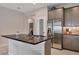 This open kitchen features stainless steel appliances, spacious countertop, and modern cabinets at 3115 Trustee Ave, Sarasota, FL 34243
