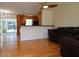 Living room with hardwood floors and view into kitchen at 3345 Bailey St, Sarasota, FL 34237