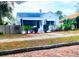 Lovely one-story home with a screened porch and lush greenery at 3642 Dartmouth N Ave, St Petersburg, FL 33713