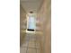 Interior hallway with tiled floor and neutral walls at 4067 Lake Bayshore Dr # 302, Bradenton, FL 34205