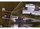 Aerial view of waterfront home with private dock and pool at 4110 Riverview Blvd, Bradenton, FL 34209