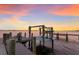 Private dock with boat lift and calm water views at 4110 Riverview Blvd, Bradenton, FL 34209