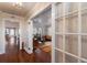 Bright hallway with French doors opening to living room at 4110 Riverview Blvd, Bradenton, FL 34209