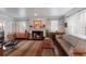 Spacious living room with fireplace and mid-century furniture at 4110 Riverview Blvd, Bradenton, FL 34209