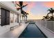 Relaxing waterfront pool area at sunset at 4110 Riverview Blvd, Bradenton, FL 34209