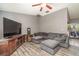 Relaxing living room with a sectional sofa and hardwood floors at 4239 Durant St, Port Charlotte, FL 33948