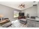 Bright living room with ample natural light and comfy seating at 4239 Durant St, Port Charlotte, FL 33948